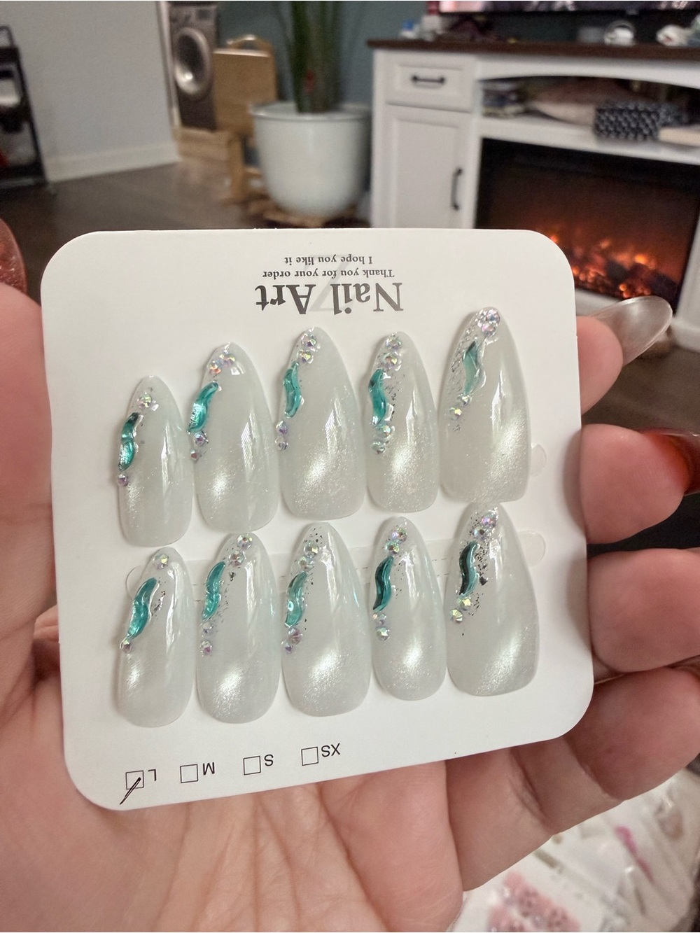 Pearlescent White Press-On Nails with Teal Swirl and Rhinestones